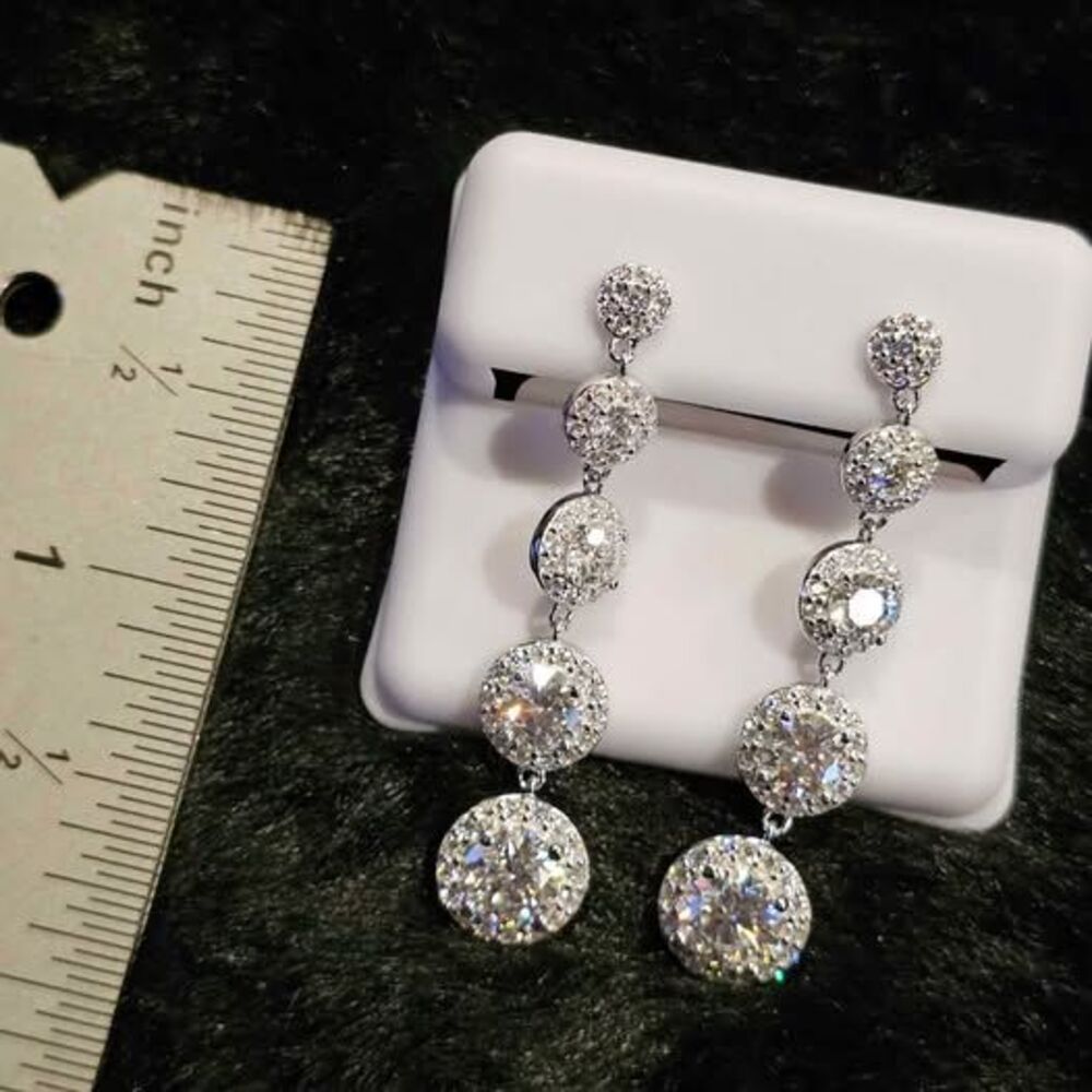 5.18CTW VVSD Moissanite earrings in .925 sterling silver